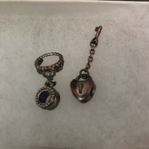 Two pandora bracelet charms
